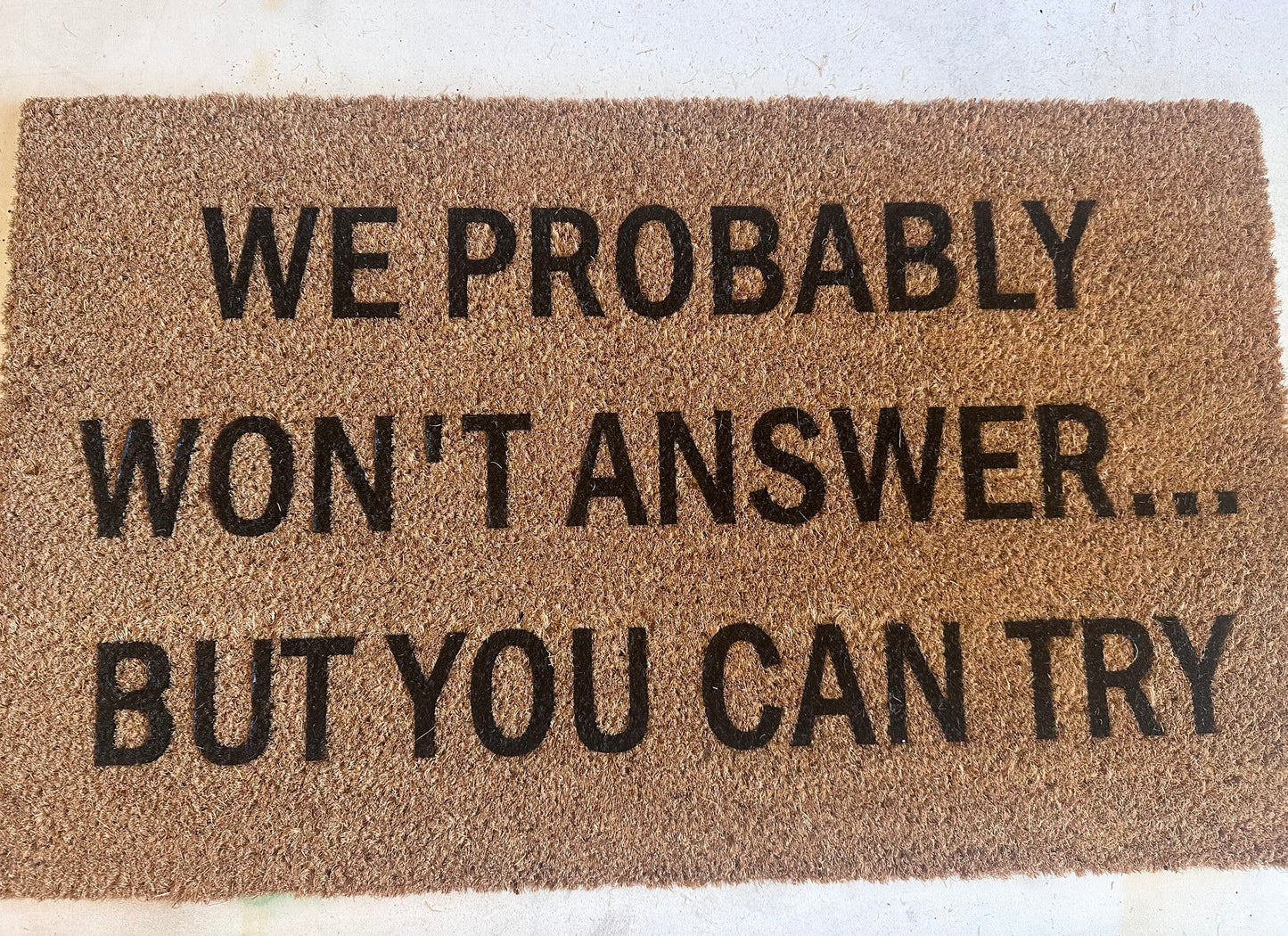 We probably won’t answer… but you can try | Doormat